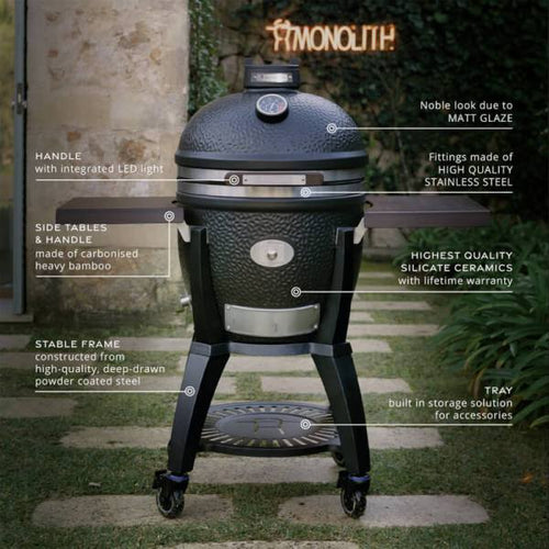 Monolith Kamado grill with LED handle and storage tray for outdoor cooking
