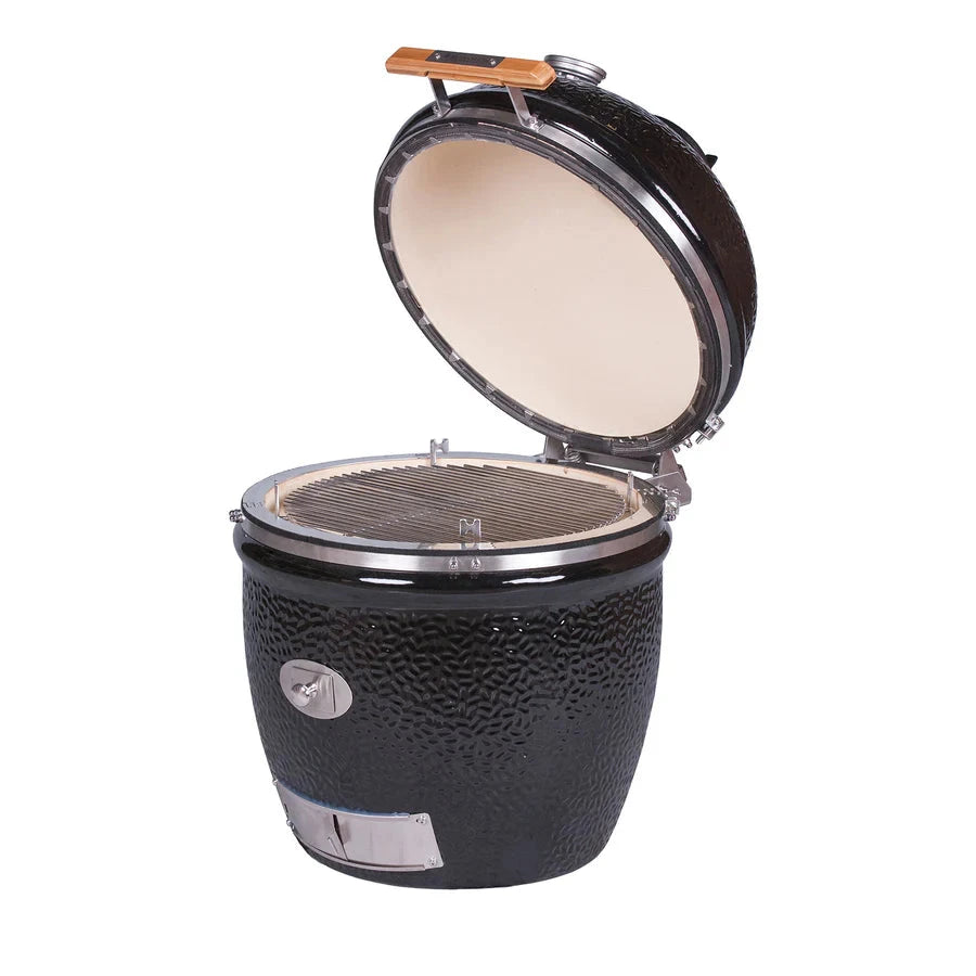 Black Kamado grill with textured surface and open lid for grilling