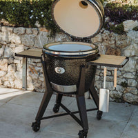 Kamado grill with side tables and wheels for outdoor cooking