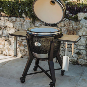 Monolith TWO 66 Kamado Grill with open lid, showing spacious cooking grate and bamboo shelves, ideal for versatile outdoor grilling experiences.