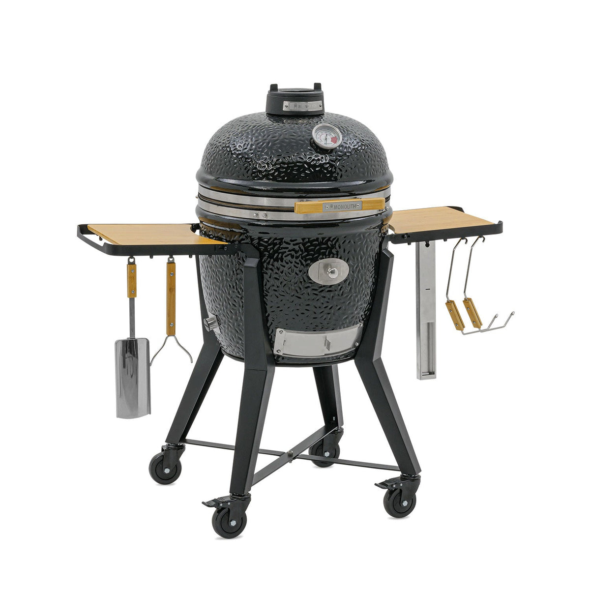 Black Kamado Grill with side tables and adjustable vents for outdoor grilling