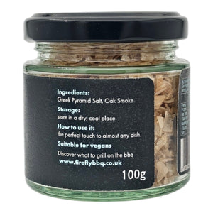 Ingredients and usage instructions on Oak Smoked Greek Pyramid Salt jar, emphasizing its vegan-friendly and versatile culinary use.