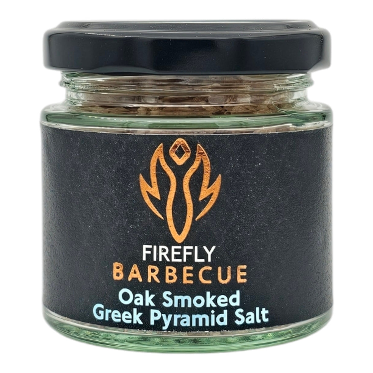 Hand holding oak smoked Greek pyramid salt chunks