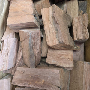 Close-up of Pimento Wood Chunks 1kg for Smoking & Jerking, showing natural grain and texture. Great for long-lasting smoke in BBQ and jerk recipes.