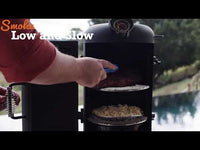 User placing ribs inside OzPig Oven Smoker with text overlay 'Smoke Low and Slow'. Great for outdoor BBQ and slow cooking meats.