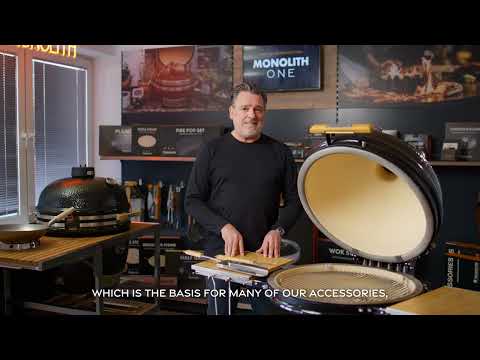 Man demonstrating Monolith ONE grill accessories in store