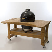 Primo Kamado Ceramic BBQ Grill mounted in a wooden outdoor table cart with storage shelf, perfect for backyard grilling setups.