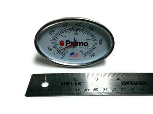 Primo Grill Thermometer with ruler for size reference, designed for accurate temperature control in Primo ceramic grills.