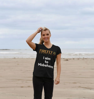 Black Women's V Neck T Shirt with 'I aim to Misbehave' text and Firefly Barbecue logo, worn outdoors, made from organic cotton.