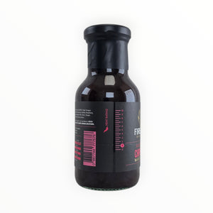 Black BBQ sauce bottle with pink measurement markings and Firefly logo
