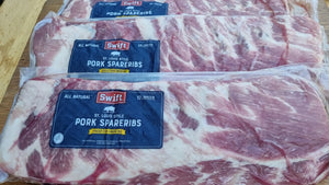 Packaged pork spareribs with label for smoking
