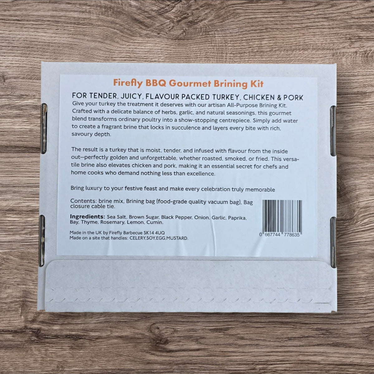 Back of Firefly BBQ Gourmet Brining Kit box detailing ingredients and usage for juicy turkey, chicken, and pork brining.