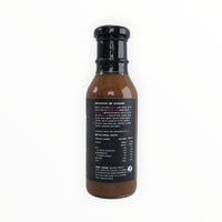 Carpe Diem BBQ sauce bottle with award badge and ingredients