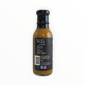 Bottle of Waz's Sauce Island Breeze Mango Sauce with awards