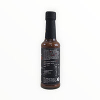 Waz’s Sauce hot sauce bottle with detailed ingredients list