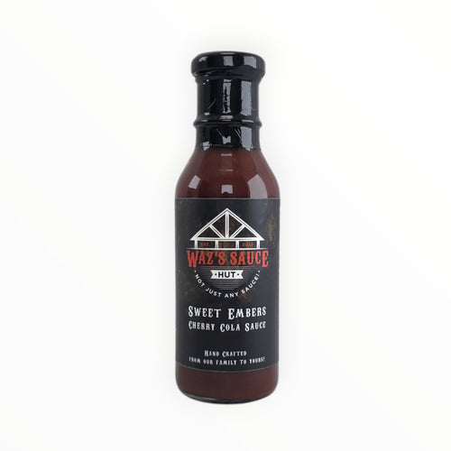 Sweet Embers Cherry Cola BBQ Sauce bottle with black cap