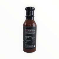 Waz's Sauce bottle with black cap and ingredients list