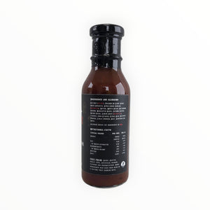 Waz's Sauce bottle with black cap and ingredients list