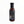 Waz's Sauce bottle with black cap on rustic wooden surface