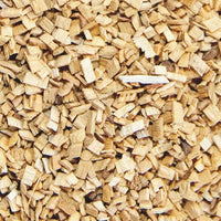 Close-up of Borniak Birch Smoking Chips showing fine wood texture, ideal for enhancing flavor in smoked poultry and trout dishes.