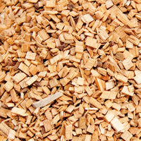 Close-up of chopped oak wood chips for smoking