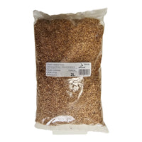 Close-up of chopped alder wood smoking chips in a transparent bag for barbecue