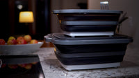 Stacked collapsible BBQ prep tubs with lids for outdoor grilling and food storage