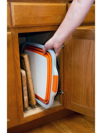 Storage of cutting boards in kitchen cabinet