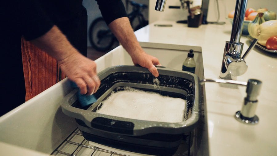 Dishwasher cleaning of BBQ prep tub with foam