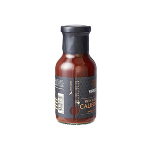 Side view of Firefly BBQ California Apple BBQ Sauce bottle showing label design and ingredients, perfect for grilling sauces category.
