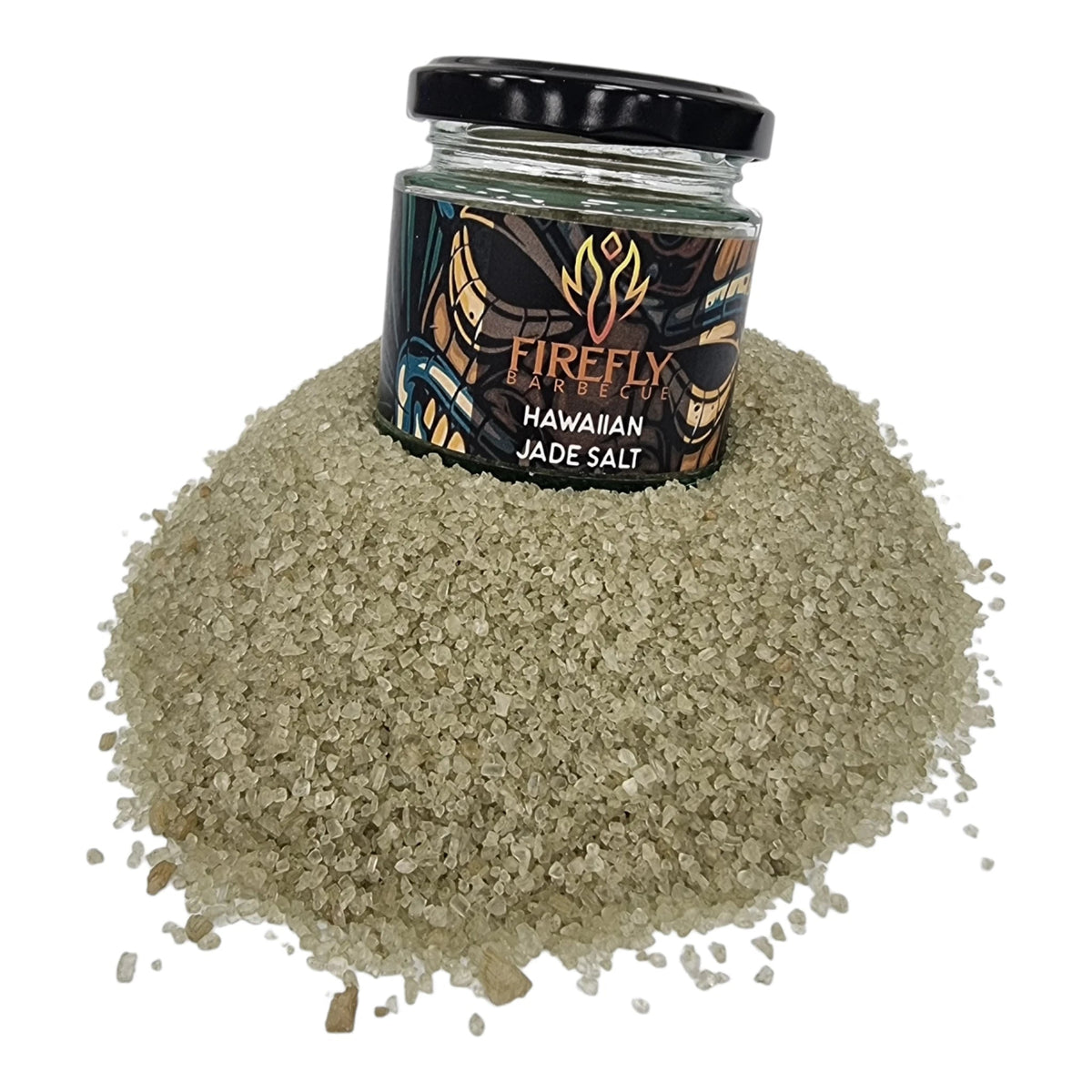 Hawaiian Bamboo Jade Sea Salt jar with black lid on salt mound
