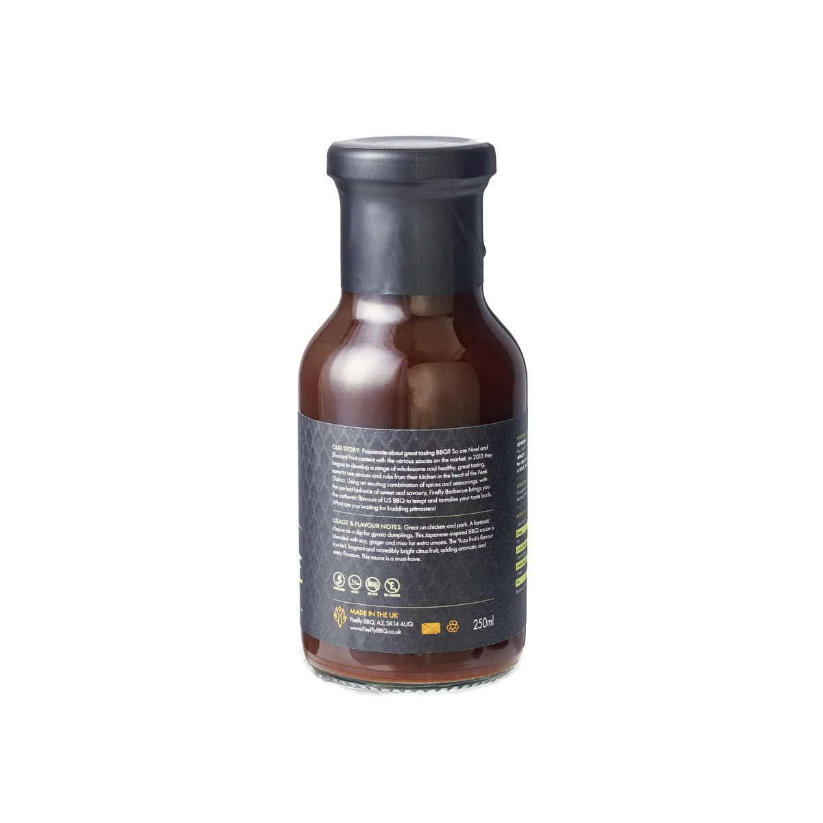 Back label of Firefly Japanese BBQ Sauce 250ml bottle with ingredients and certifications. Halal, vegetarian-friendly citrus marinade.