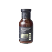Rear view of Firefly Japanese BBQ Sauce bottle showing nutritional info and barcode. Yuzu BBQ sauce for enhancing grilled dishes.