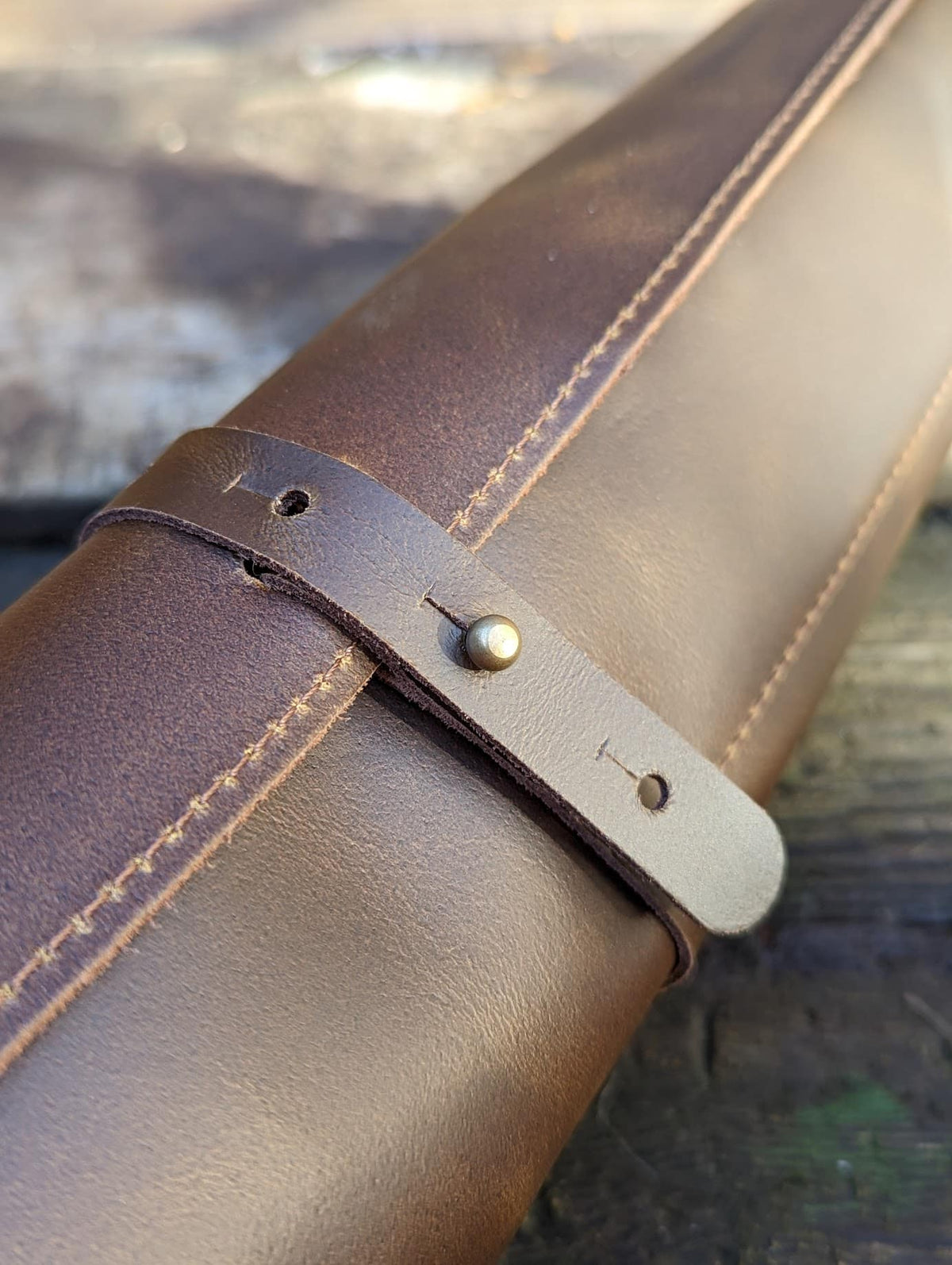 Leather knife roll with stitching detail