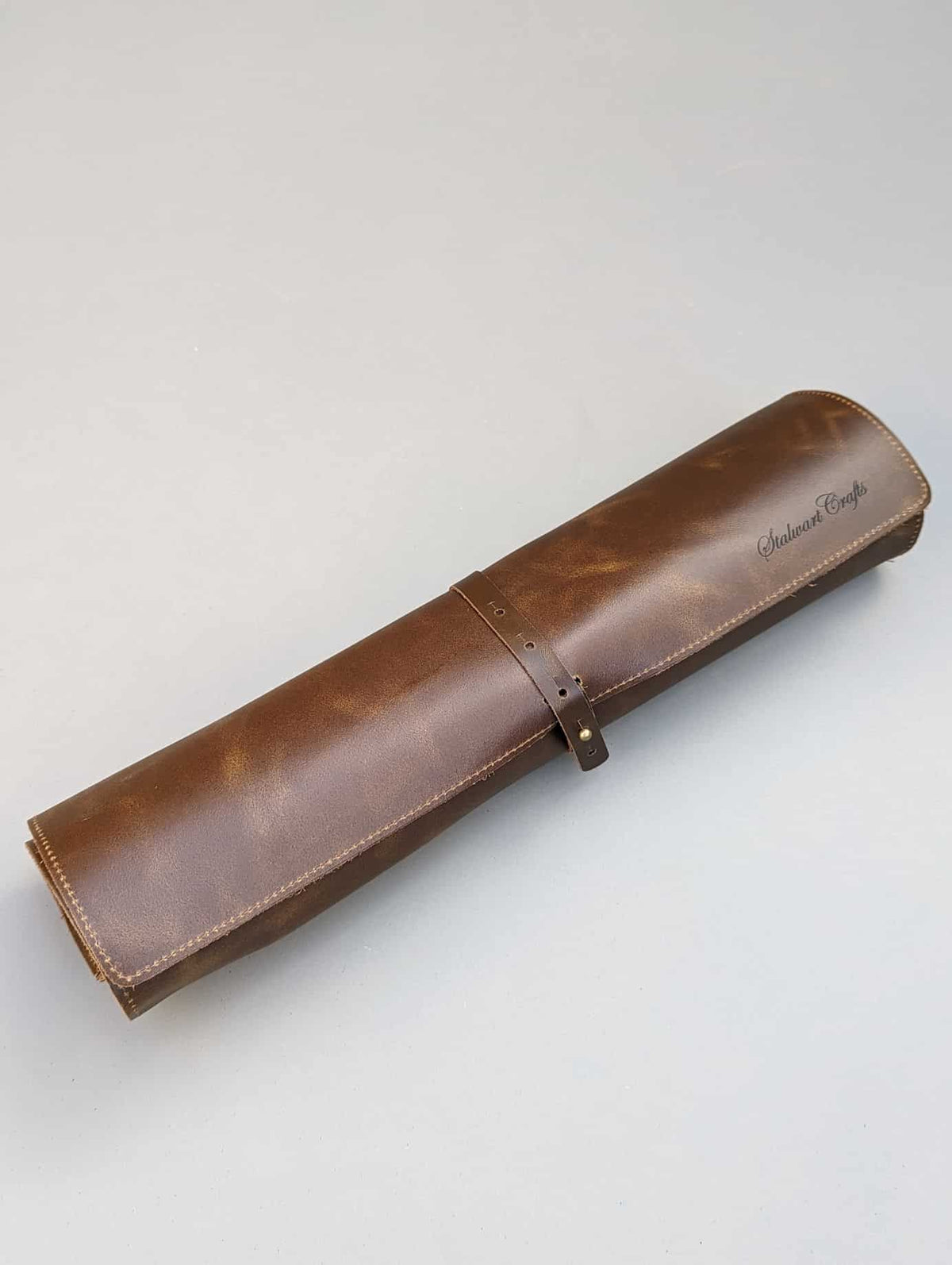 Closed leather knife roll with logo