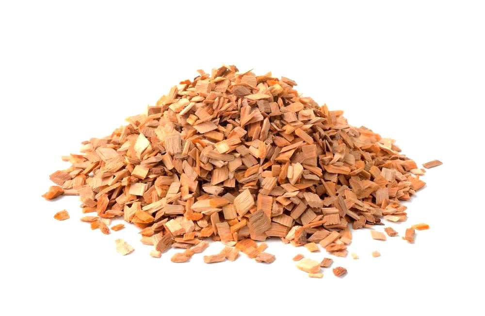 Oak wood BBQ smoking chips for flavorful outdoor grilling