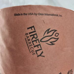 Close-up of OREN Pink Butchers Paper Roll - BBQ Meat Smoking | FDA Approved with Firefly Barbecue branding and 'Made in the USA' label by Oren International.