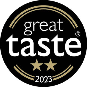 Great Taste 2023 two-star award badge earned by Firefly Barbecue Smoked Jalapeño Jam, highlighting its premium flavor profile.
