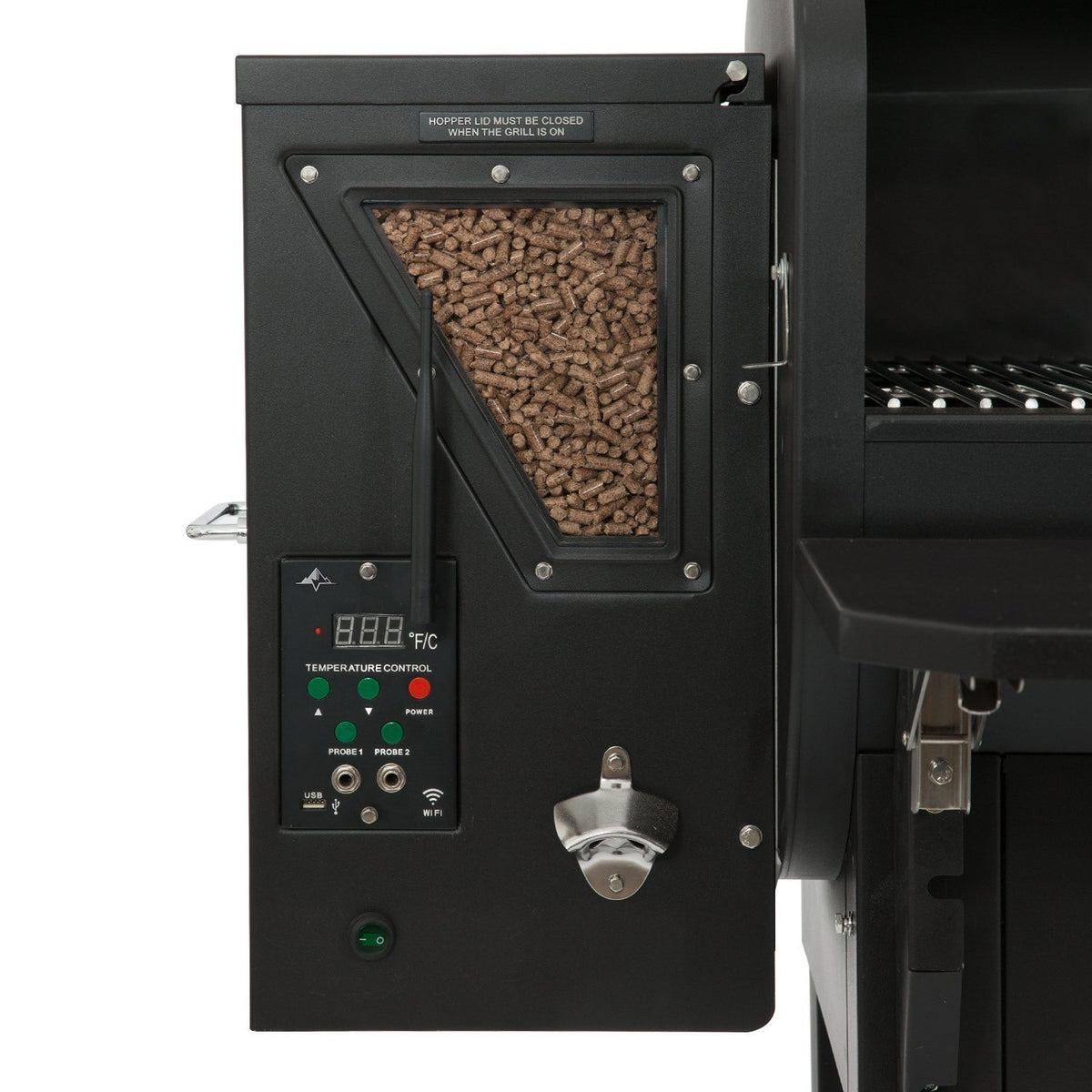Close-up of GMG LEDGE Pellet Grill digital control panel and pellet hopper, offering precise temperature control and fuel monitoring.