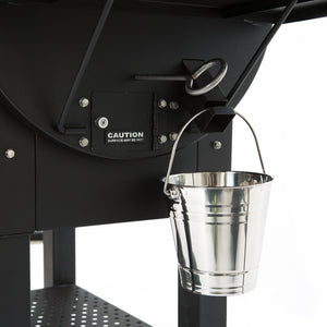 Close-up of GMG LEDGE Pellet Smoker grease bucket attachment, designed for easy cleanup and efficient grease management during grilling.