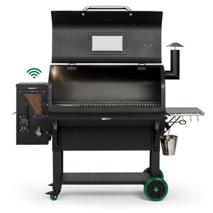Open Green Mountain Grills PEAK Prime pellet grill showing spacious cooking area, pellet hopper, and Wi-Fi smart control panel.