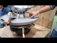 Monolith Fire Plate - Icon in use with wok and kettle, showing multifunctional cooking setup on kamado grill for outdoor barbecue enthusiasts.