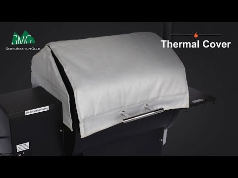 Silver GMG Thermal Blanket - FireFly Barbecue thermal cover on a grill, demonstrating insulation benefits for winter grilling.