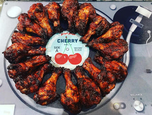 Grilled chicken drumsticks seasoned with Kansas BBQ Rub - Sweet & Smoky arranged in a circle. Perfectly caramelized and smoky.