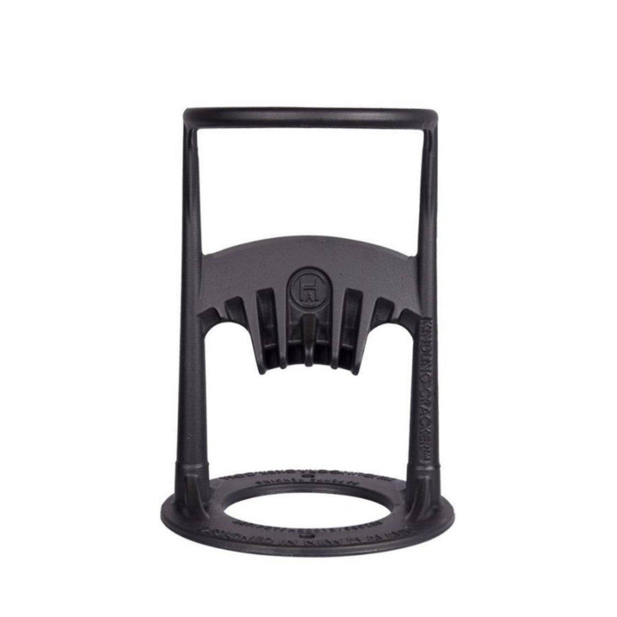 Black plastic log splitter with wood for kindling