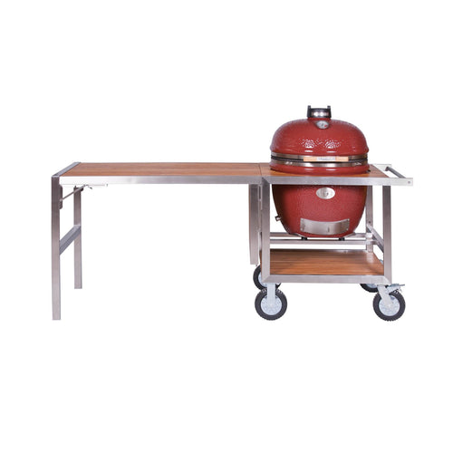 Red ceramic Kamado-style grill on outdoor kitchen cart with teak surface