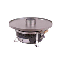 Monolith Fire Plate - Junior and ICON mounted on ceramic grill, ideal for outdoor barbecue cooking with adjustable temperature control.