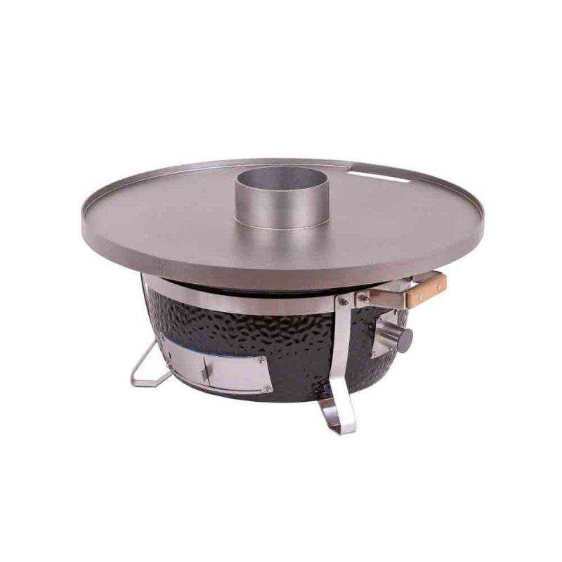Monolith Fire Plate - Junior and ICON mounted on ceramic grill, ideal for outdoor barbecue cooking with adjustable temperature control.