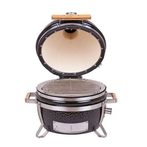 Open MONOLITH Icon Kamado Grill revealing stainless steel cooking grate and ceramic interior, ideal for grilling on balconies or patios.
