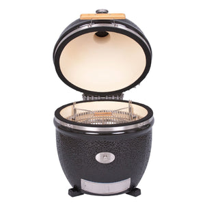 Monolith Le Chef Pro Series 2.0 Kamado Grill with open lid showing spacious ceramic interior and grill system for high-capacity cooking.